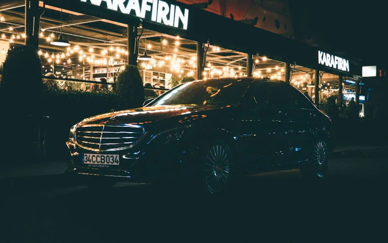 Black private hire car at night in Tunbridge Wells